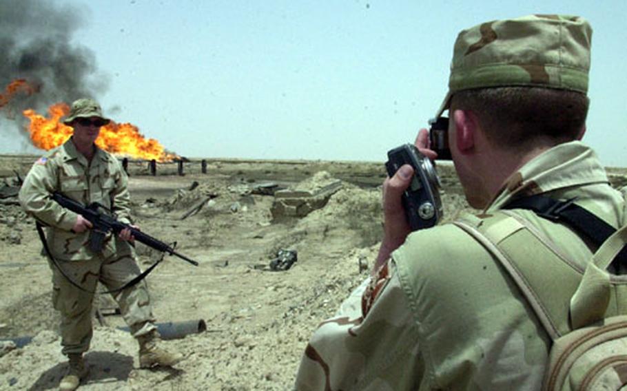 Years from now, photographs from a day out on the Iraqi oil fields will serve as reminders for U.S. troops who toured the demilitarized zone.