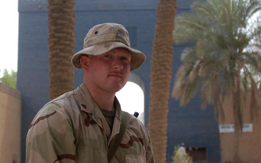 Lance Cpl. Scott Baker, a truck company reservist from Tarentum, Penn., attached to the 1st Marine Division in Iraq, stands inside a replicated Ishtar Gate — the original is in Berlin — the entrance to Babylon. He's seen the ruins of Babylon twice.