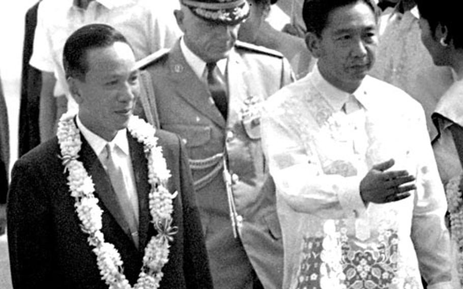 Also arriving at the airport that day was South Vietnamese Premier Nguyen Van Thieu, left, being greeted by Ferdinand Marcos.