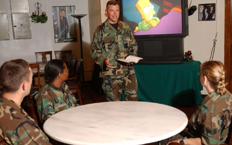 Chaplain (Maj.) Steve Schaick, 39th Air Base Group senior protestant chaplain, leads a recent Bible study based on "The Simpsons" at the Crossroads Cafe at Incirlik Air Base, Turkey.