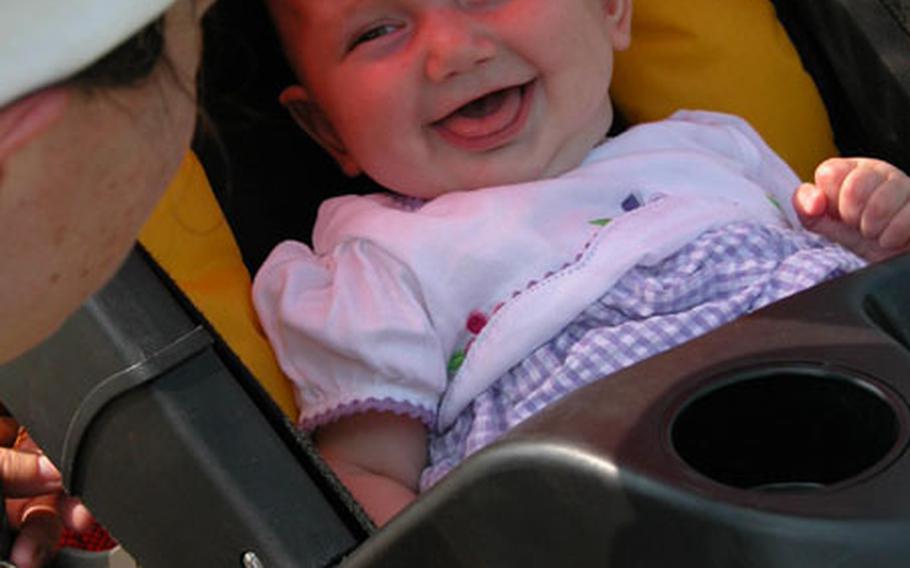 Five-month-old Isabella Monticelli gives a smile to her mother, Cindy. Isabella has grown up not knowing her father, Spc. Pietro Monticelli of the 2nd Battalion, 503rd Company, who was deployed for Operation Iraqi Freedom just days after she was born. "Her father had had no input and will have no input for the first year of her life," Cindy Monticelli said.