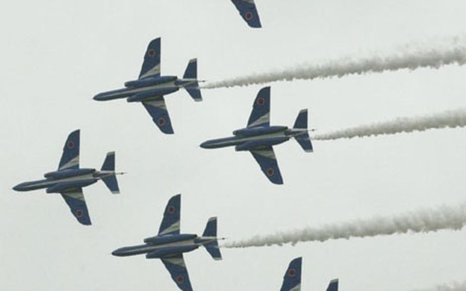 The Japanese Air Self-Defense Force's Blue Impulse Jr. aerial demonstration team perform some eye catching manuevers at the Misawa Airfest held at Misawa Air Base.