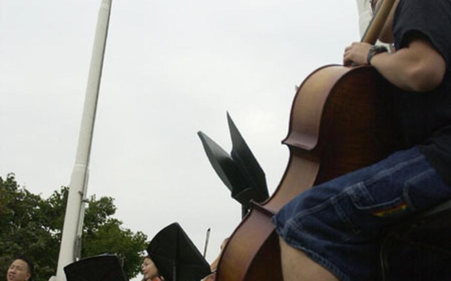 A string ensemble from Seoul American High School plays at a ceremony to mark the second anniversary of the Sept. 11, 2001 attacks.