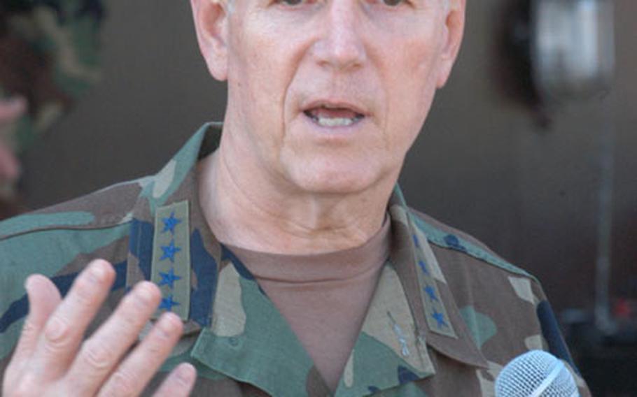 Chairman of Joint Chief of Staff, Air Force Gen. Richard B. Myers, talks to the press during his stop at Eagle Base, Bosnia and Herzegovina, on Thursday.