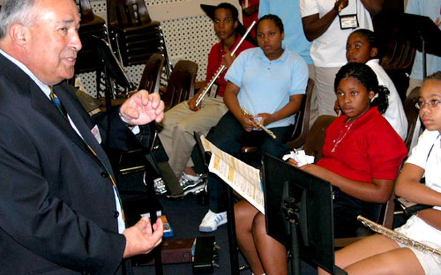 Schweinfurt Middle School students from Christopher Humphrey’s beginning band class listen to Joseph D. Tafoya, director of The Department of Defense Education Activity (DODEA).