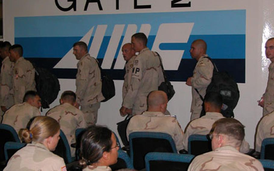 Soldiers arrive at Rhein-Main Air Base just after 12:30 a.m. Friday morning.