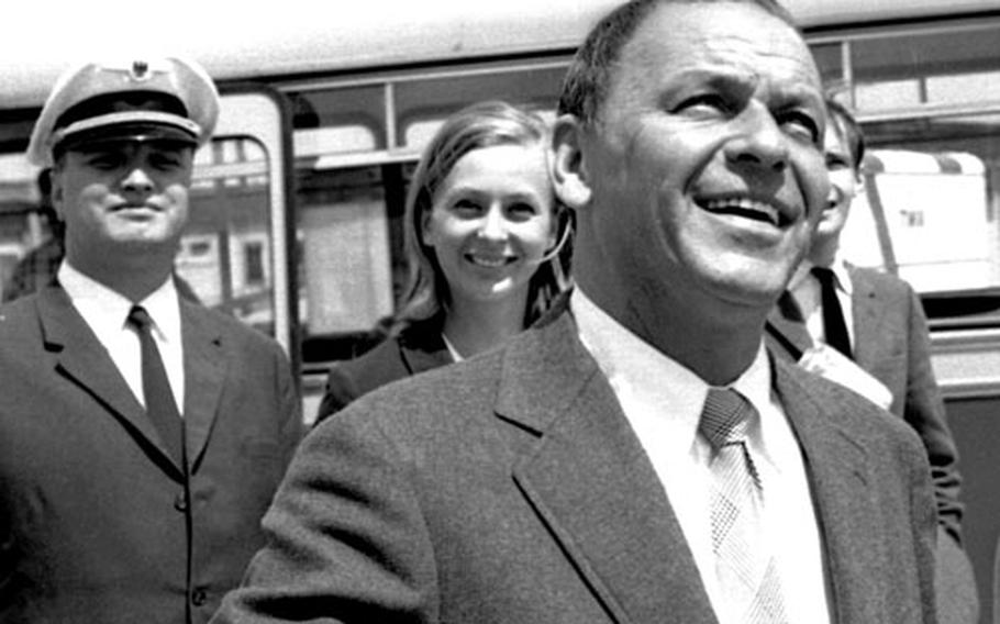 Frank Sinatra arrives at the Frankfurt airport in June, 1968.