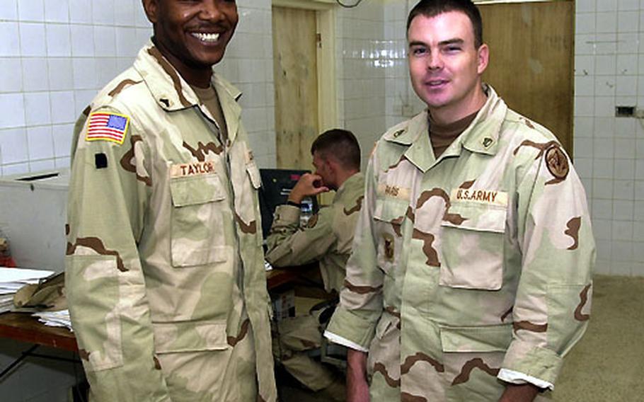 Sgt. Andre Taylor, left, and Staff Sgt. Michael Paris say many variables affect the soldiers' decisions on whether to re-enlist.