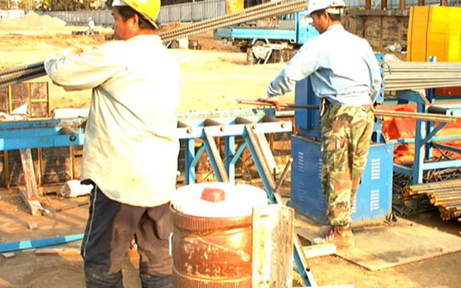 Workers at Osan Air Base in South Korea are building what will become the biggest shopping mall on any U.S. military installation in Korea. The $24 million mall is set to open next fall.