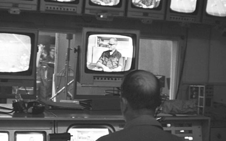Sen. Barry Goldwater, R-Ariz., is seen on TV monitors as he is interviewed during his tour of the Far East in December, 1969.