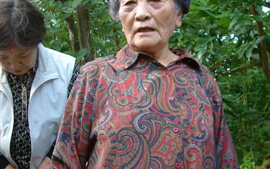 Toyo Fukuji, 80, grew up in the area of the Iibaru Bijuru, a Shinto prayer site rededicated Thursday on Kadena Air Base.
