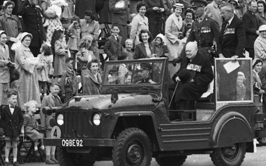 Former British Prime Minister Sir Winston Churchill reviews his old regiment, the 4th Queen's Own Hussars, at Hohne, West Germany, in May, 1956.