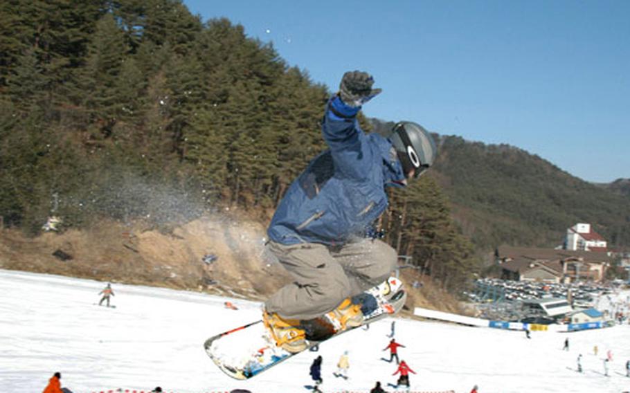 A snowboarder at the terrain park at Yongpyong resort.