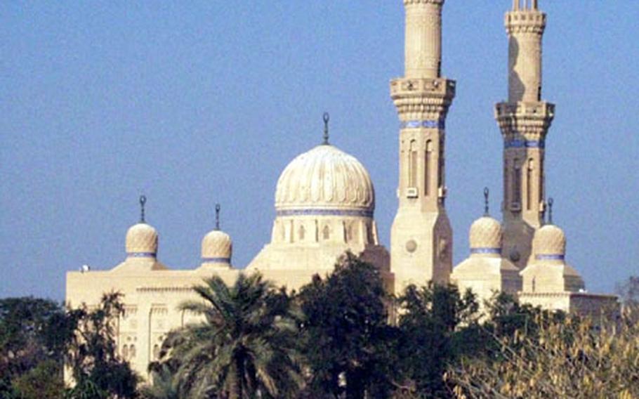 U.S. Army troops and Iraqi forces raided the Ibn Taymiyyah mosque in Baghdad on Thursday, resulting in street protests and claims the military tore pages of the Koran.