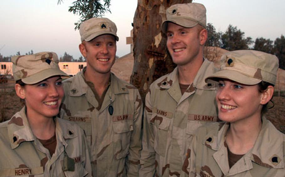 Two sets of twins serve in the same engineer battalion in Balad, Iraq. From left are: Spc. Amanda Henry, Sgt. Justin Stearns, Spc. Jamie Stearns and Spc. Amy Henry.