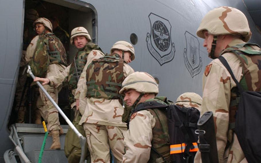 Soldiers board a C-17 at Ramstein Air Base, Germany, on Friday bound for Operation Iraqi Freedom.