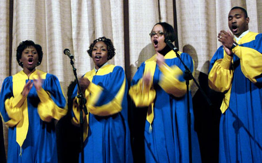From left, Tanisha Norris, Janielle Thompson, Karnita Allen and Adell Jones sing a gospel number during the Mannheim, Germany, military community’s celebration honoring Dr. Martin Luther King Jr. at the Schuh Theater on Wednesday.