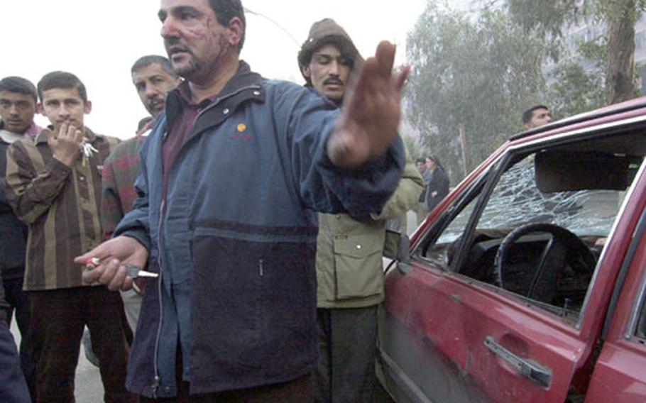 An Iraqi man explains how he was past the blast area heading toward the bridge when the explosion threw his car down the street.