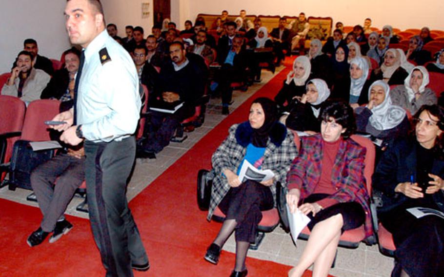 Maj. Edward Mattison, 35, of Corning, N.Y., lectures Baghdad University students about his computer science program at the U.S. Military Academy at West Point, N.Y.