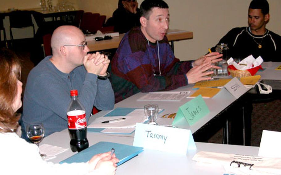 From left, Tammy Walker, Staff Sgt. James Matney, Maj. Sean McGovern and Sgt. Edgardo Sanchez talk about issues involving families Tuesday at the 293rd Base Support Battalion&#39;s Army Family Action Plan conference.