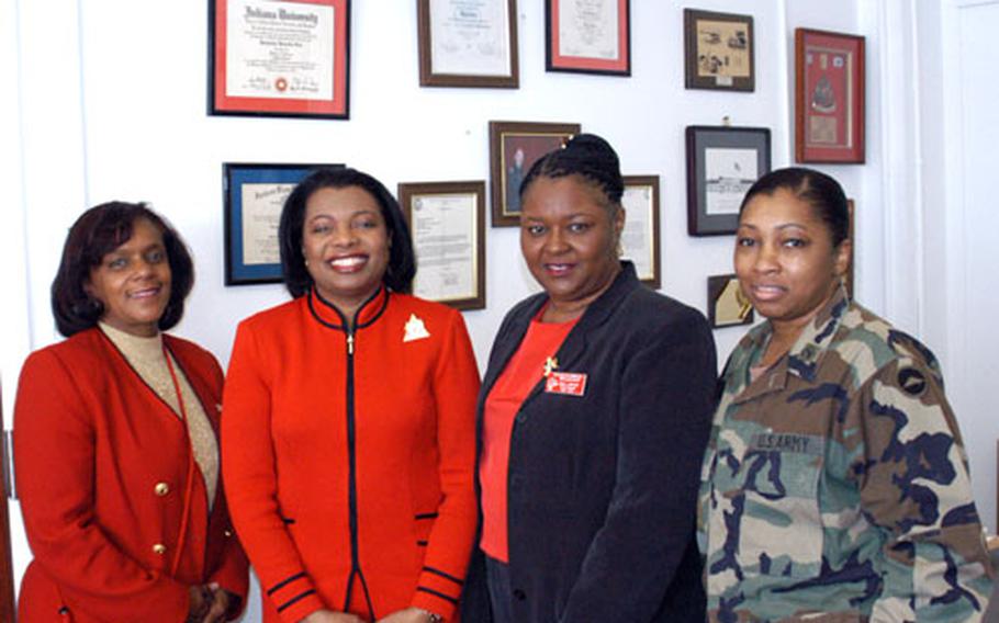 Local and stateside members of the Delta Sigma Theta sorority - the largest African-American women's sorority in the world - meet at Camp Zama this month. From left are Dr. Vanita Nicholas; Dr. Thelma James Day, far west regional director; Bonnie Cheatham, Tokyo Alumnae Chapter president; and Maj. Jacqueline Lett, Camp Zama.