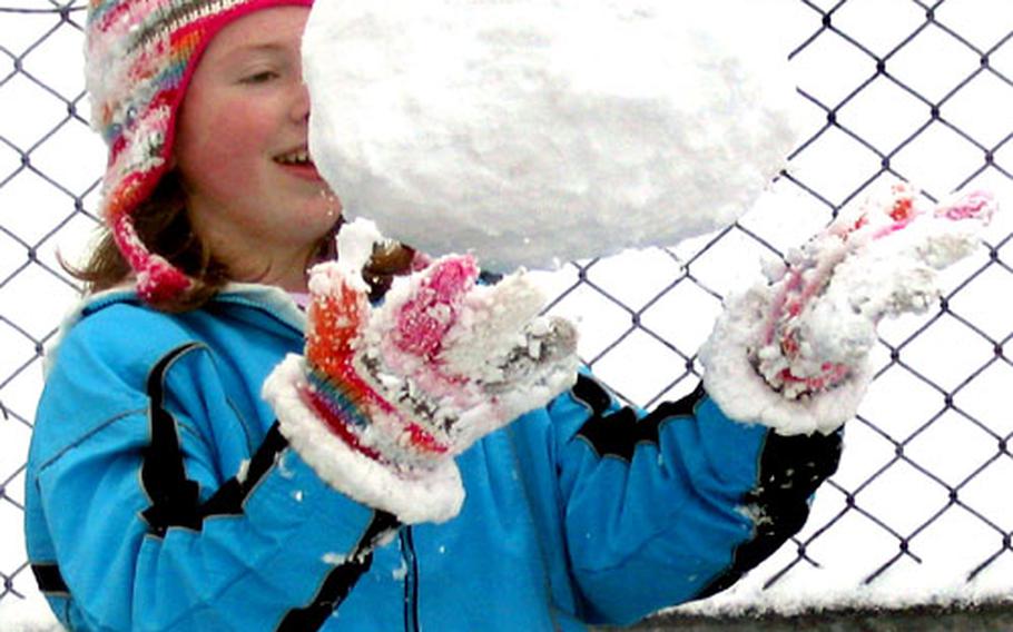 Victoria Carpenter, 11, created a snowball to counteract anything in her friends' arsenal during last week's snowy weather at Sasebo.