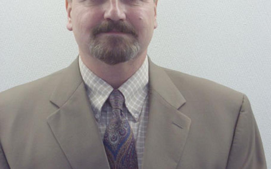 Don Reed was injured Nov. 25 by shrapnel from a mortar round fired at a U.S. Army camp in Iraq. On Friday, the Defense Logistics Agency-Europe employee received the Purple Heart.