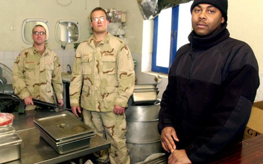From right, Staff Sgt. Calvin Alston, Pfc. Troy Staley and Spc. Nicholas Louderbough are kings of their dining facilities, trying to make troops’ lives better with extra food and better condiments. They can give you extras if you’re nice, but command has directed the cooks to cut the fat, so Lobster Alfredo is off the menu.