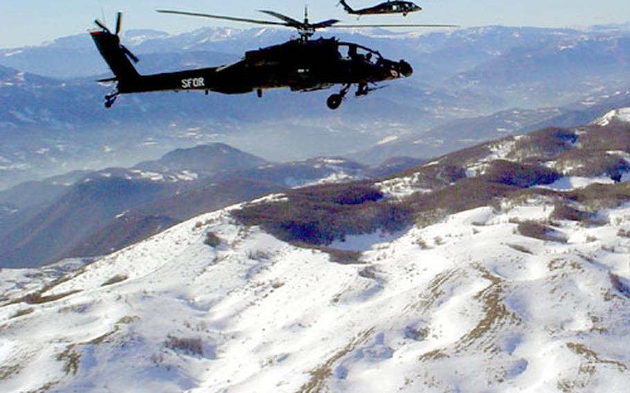 American Task Force Renegade troops fly over southeastern Bosnia and Herzegovina in support of international peacekeepers there. Troops spent about ten days providing aerial support to Multinational Brigade Southeast.