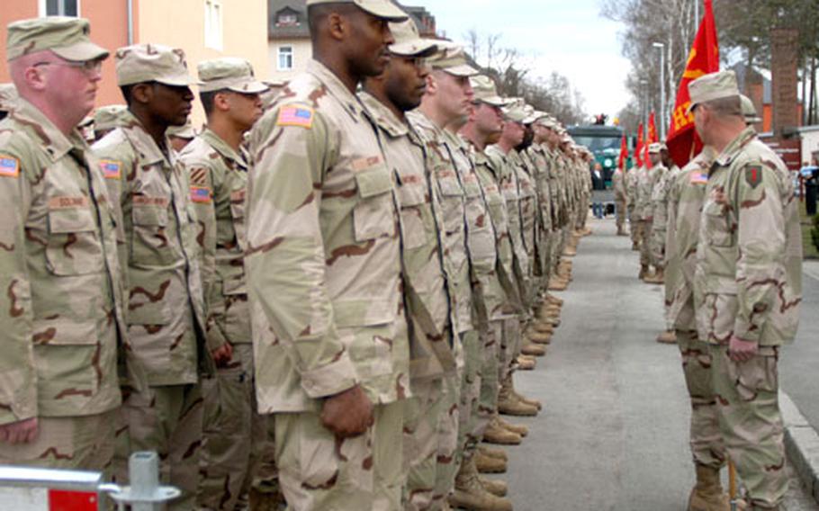Soldiers from 1st Battalion, 33rd Field Artillery Regiment stand in formation Feb. 5 at a ceremony to case the battalion colors before deploying to Iraq. The unit deployed Tuesday and was expected to arrive in Kuwait on Wednesday.