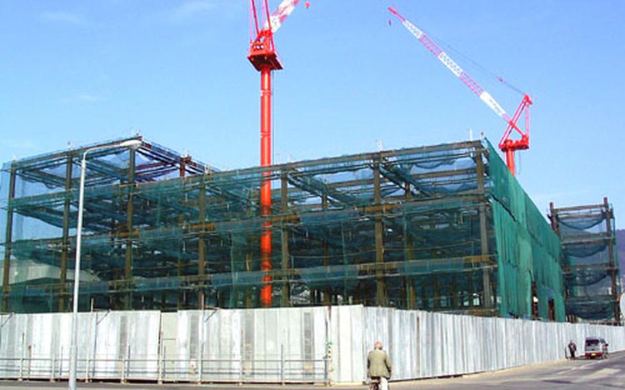 Construction is ongoing at the new ship support complex at Sasebo Naval Base, Japan.