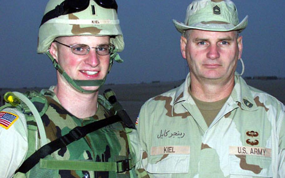 1st Lt. Cheyenne Kiel, 23, and his father, Master Sgt. David Kiel, 45, were reunited for three hours Monday at Camp New York, Kuwait. David Kiel, an Army reservist, is near the end of a six-month tour in Iraq, while Cheyenne Kiel, tactical operations officer for the 1st Infantry Division’s 1st Battalion, 77th Armor, is just beginning a yearlong deployment.