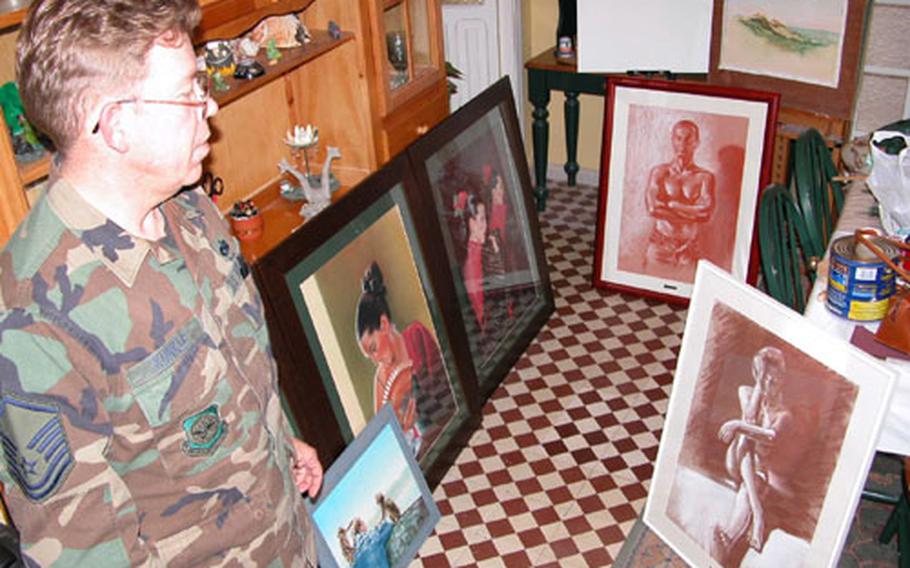 Air Force Master Sgt. Jeffrey Kunkle paints pastels, watercolors and oils and sells them for up to $1,000 each. The quality assurance inspector for the 725th Air Mobility Squadron at Rota Naval Station, Spain, recently showed his work at a gallery in Chipiona.