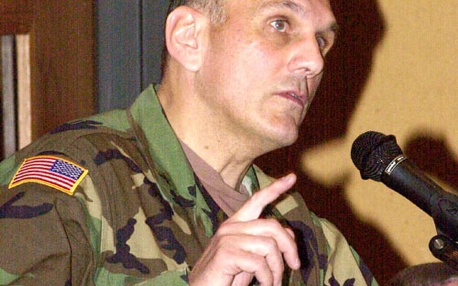 Brig. Gen. Jerome Haberek, deputy chief of chaplains, speaks Monday at Dragon Hill Lodge on Yongsan Garrison, South Korea. He is working to encourage more young GIs to join the Army’s chaplain corps.