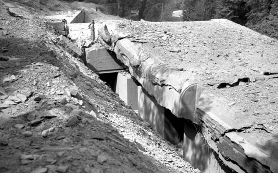 The bunker's walls were made of reinforced concrete, seven feet thick.