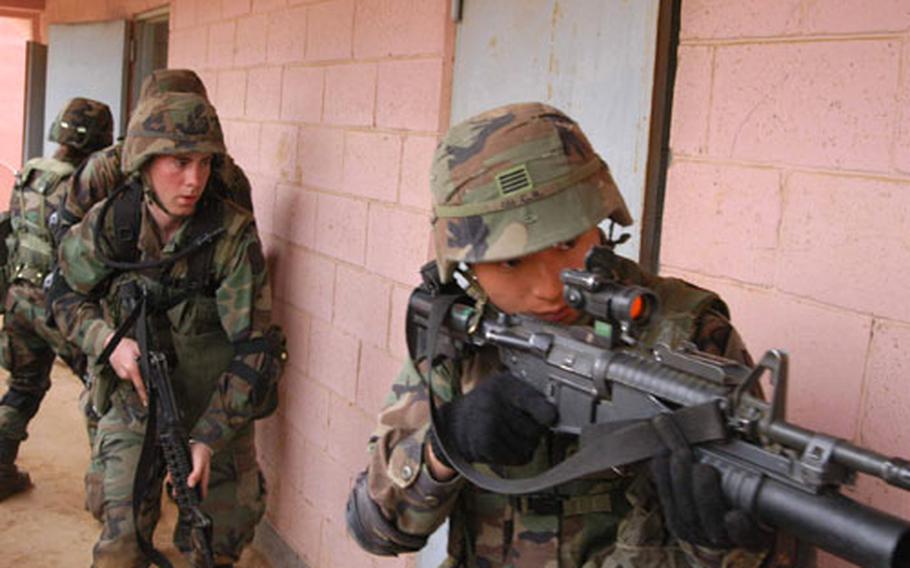Soldiers from the 55th MP Company practice urban combat techniques at Tokaebi Range on Thursday.