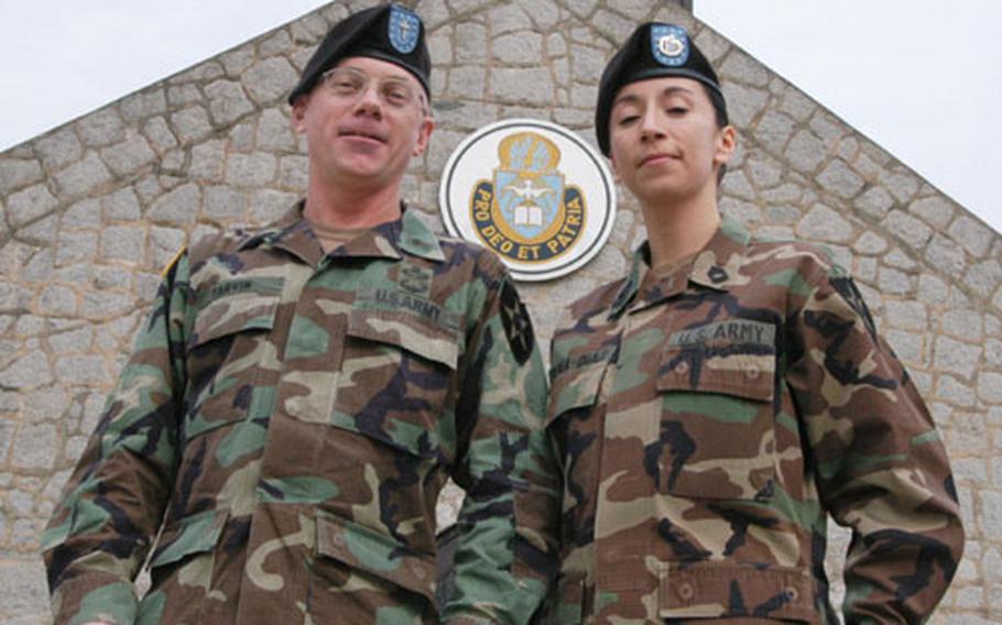 2nd Infantry Division chaplain Lt. Col. Mike Tarvin and chaplain assistant Master Sgt. Chantel Sena-Diaz outside the Camp Red Cloud chapel.