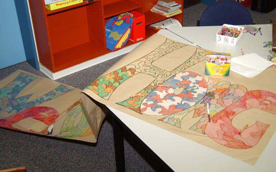 A welcome home banner lies unfinished in the library at Bad Nauheim Elementary School. The banner and others had been prepared by students in anticipation of next month's return of 1st Armored Division troops.