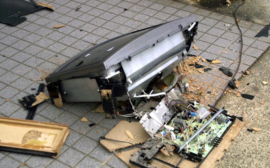 Aftermath: The shattered TV set.