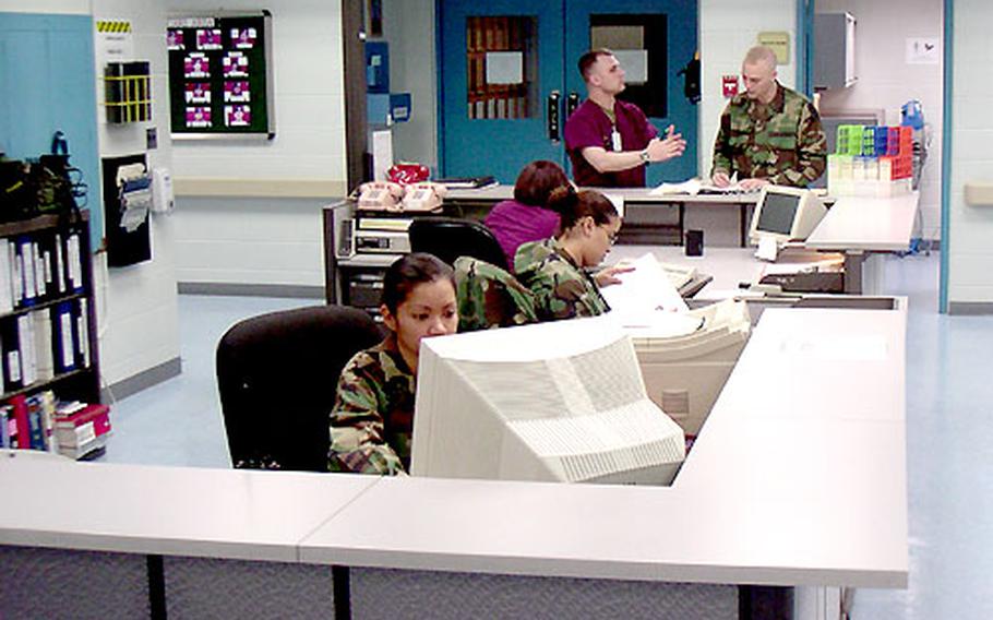 Staff members work inside the newly renovated health clinic at Camp Humphreys, South Korea. Officials are upgrading and expanding the clinic to meet a gradual increase in base population, including families with children.
