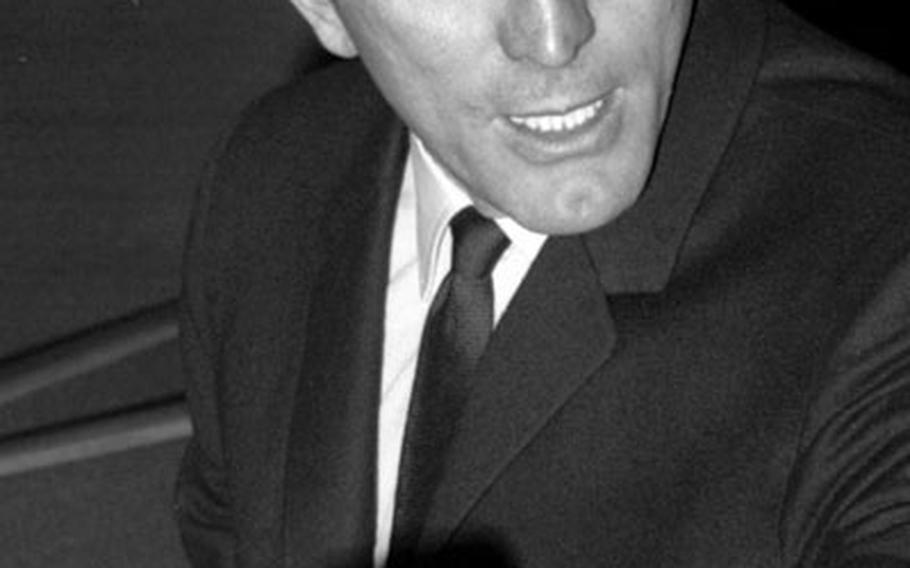 Kirk Douglas meets the press at Tokyo&#39;s Okura Hotel in March, 1964.