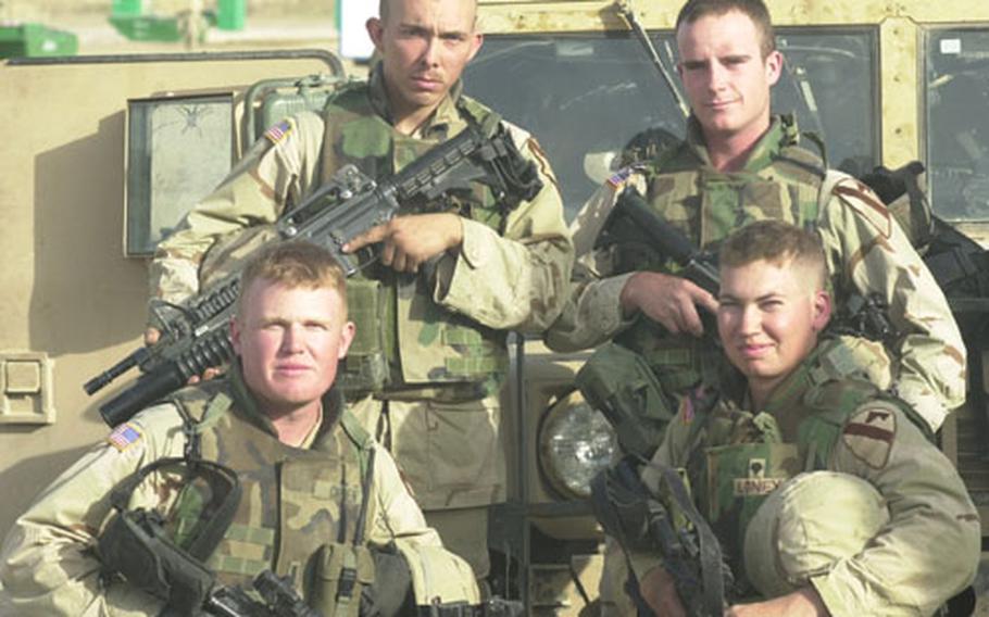 Scouts say that plain hard work, especially random traffic stops, can net crucial intelligence on the enemy. His soldiers, says 1st Lt. Rich Groen, front row left, have found everything from IEDs to lists of terrorist leaders complete with addresses. Next to Groen is Spc. Robert Loney. In the back row are Pvt. Anthony Ventura, left, and Pvt. Jacob Hounshell.