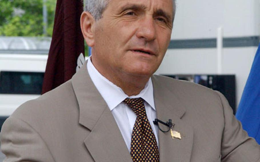Anthony J. Principi, secretary of the Department of Veterans Affairs, speaks at a press conference Wednesday at Landstuhl Regional Medical Center. Principi came to visit injured troops at the hospital and will attend this weekend's events in Normandy, France, commemorating the 60th anniversary of D-Day.