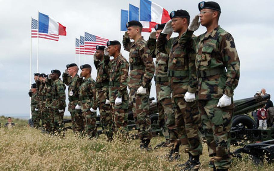 Soldiers from the Babenhausen, Germany-based 1st Battalion, 27th Field Artillery Regiment practice at Utah Beach, France, for the D-Day ceremonies to be held there on Sunday.