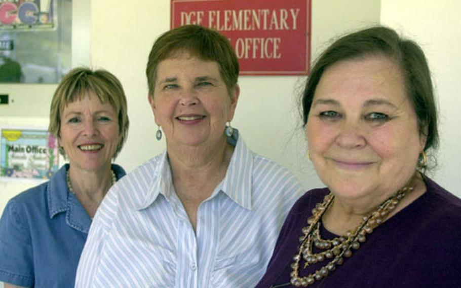 Elementary teachers Joyce Swett, left, Linda Reberdito, center, and Margaret Wier pose at David Glasgow Farragut Elementary School at Naval Station Rota, Spain. The three teachers retired Friday after a collective 100 years of teaching.