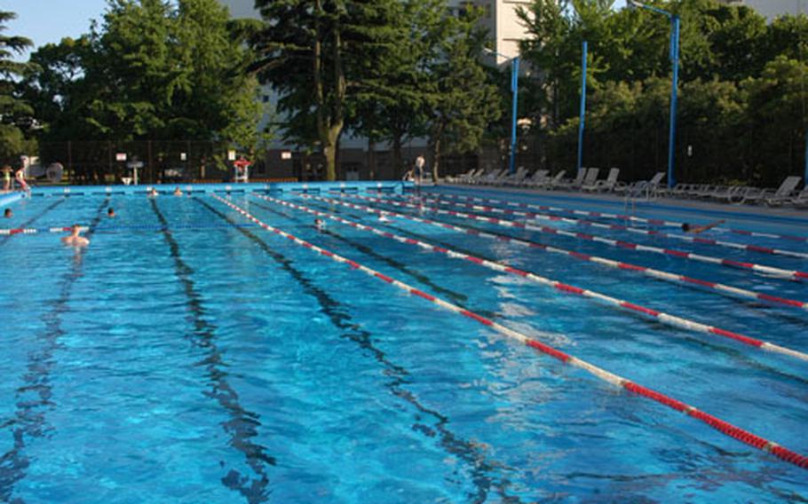 Green Beach pool, Yokosuka Naval Base's largest swimming pool, this summer costs $2 ($1 for children) as part of a base effort to make up for budget cuts and Navy-wide mandates to save money. But on Tuesday evening, the pool wasn't generating a lot of money in user fees.