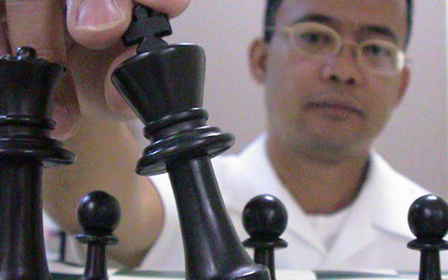 Petty Officer 1st Class Narciso Victoria recently won the military chess championships at Keesler Air Force Base, Miss. He will now be participating in the NATO championships in August.