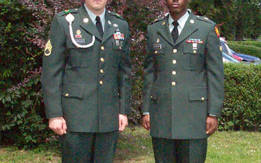 Staff Sgt. John M. Thompson of the 80th Area Support Group, left, and Spc. Ulysses C. Stewart of the 26th ASG were named the Installation Management Agency-Europe's first noncommissioned and soldier of the year, respectively, on June 25, 2004.