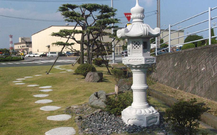 Facilities architects at Iwakuni Marine Corps Air Station use Japanese themes and local plant varieties to add aesthetic charm to the base, including this new small park outside the American Forces Network building.