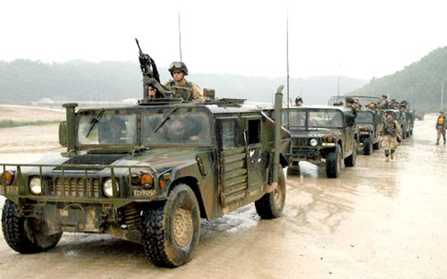 Iraq-bound 2nd Infantry Division soldiers prepare for combat convoy live-fire training at Rodriguez Range, South Korea.